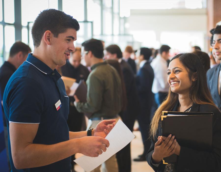 Students talking together at a career fair
