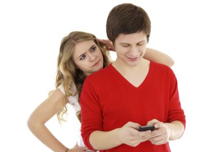 man with cellphone ignoring woman
