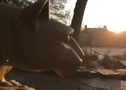 Sun rises over West halls near Shrine