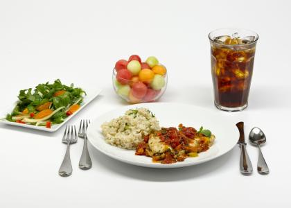 Plate of food and glass