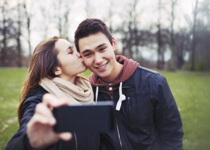 a couple taking a selfie