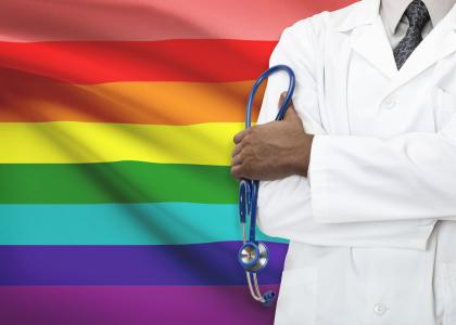 LGBT flag and dr. with stethoscope