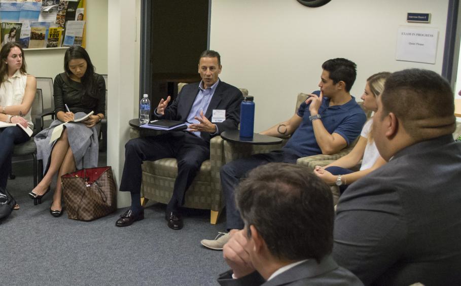 Alumni in the classroom event with the school.