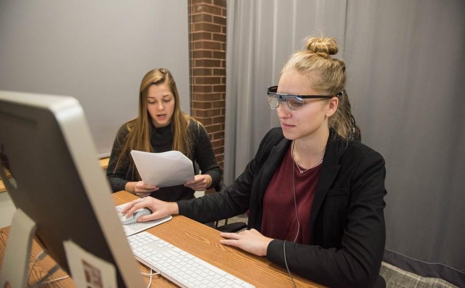Two students participating in eye tracking research.