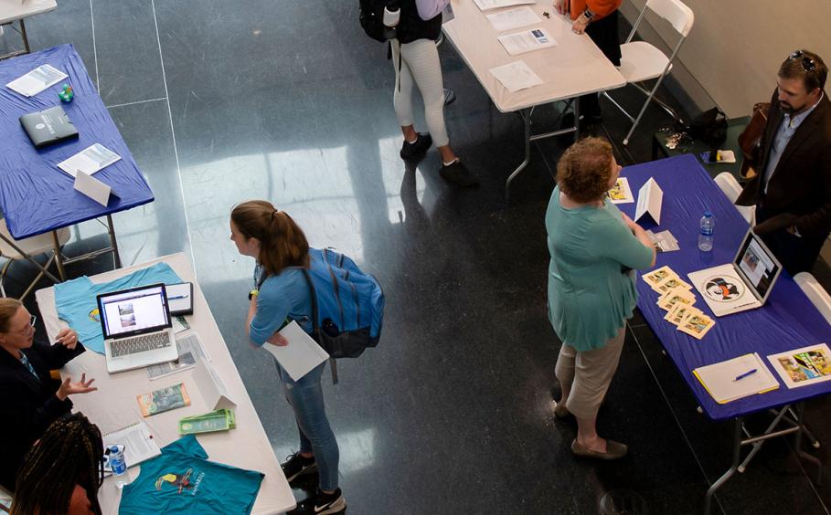 Bird's eye view of the study abroad fair in the Health and Human Development Building.