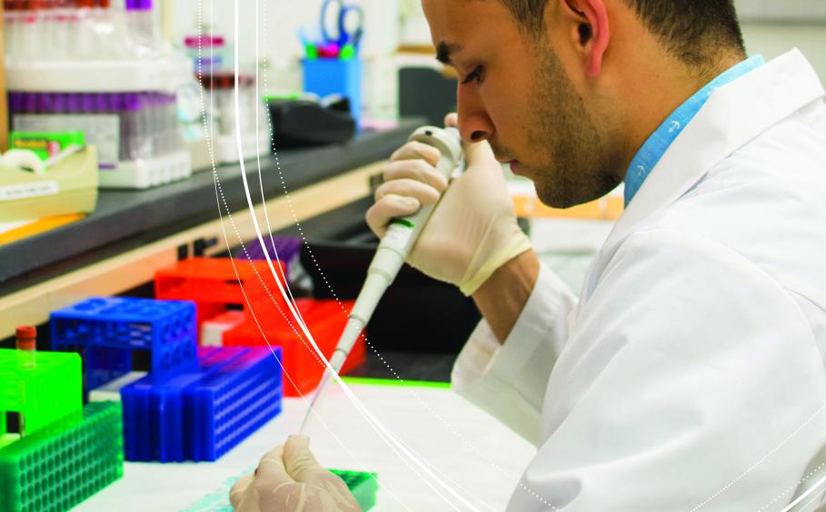 Student conducting research in a laboratory. 